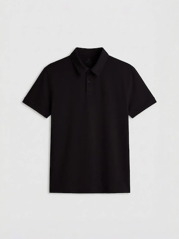 Tommy Life Poloshirt in Schwarz: Vorderseite