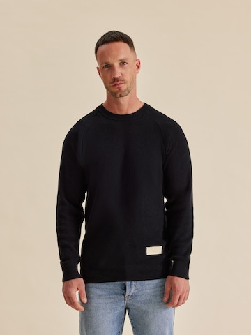 DAN FOX APPAREL Sweater in Black: front