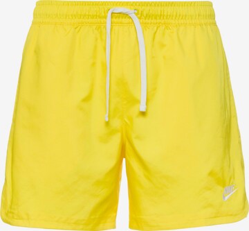 Nike Sportswear Pants 'Essentials' in Yellow: front