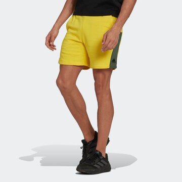 ADIDAS SPORTSWEAR Regular Workout Pants in Yellow: front