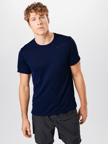 Coupe regular T-Shirt fonctionnel 'SUPERSET' NIKE en bleu : devant