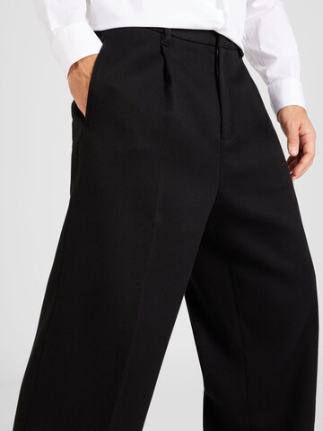 Calvin Klein Wide leg Pleat-front trousers in Black