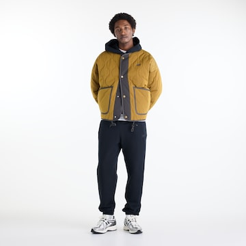 new balance Between-Season Jacket in Yellow