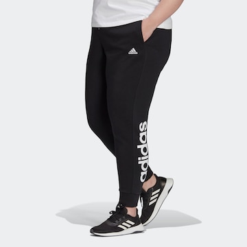 ADIDAS SPORTSWEAR Tapered Workout Pants 'Essentials French Terry Logo ' in Black: front