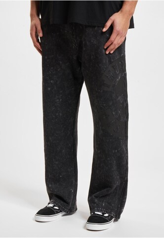 Thug Life Flared Trousers in Black: front