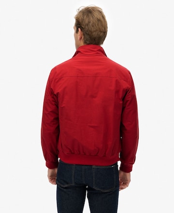 Veste mi-saison Superdry en rouge