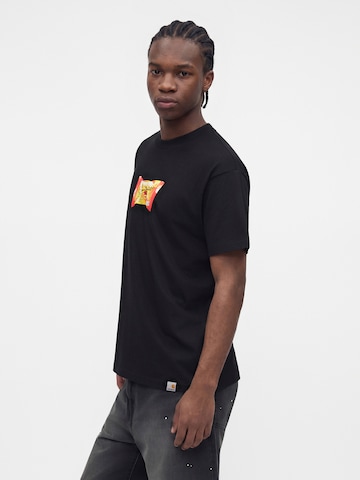 Carhartt WIP Μπλουζάκι 'Road Side Snack' σε μαύρο