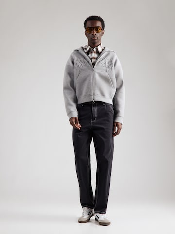 Carhartt WIP Wide leg Jeans 'Simple' i svart