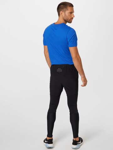 NIKE Skinny Sporthose 'Phenom Run Division' in Schwarz