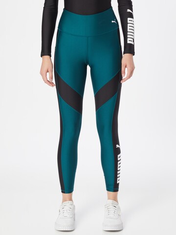 Skinny Pantalon de sport PUMA en vert : devant