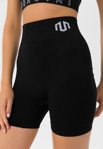 MOROTAI Skinny Sportbroek 'Naikan' in Zwart