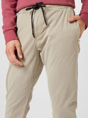 TOM TAILOR DENIM Tapered Broek in Beige