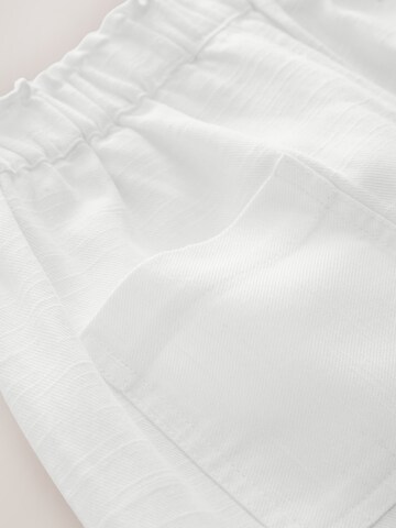 Next - Pierna ancha Pantalón en blanco