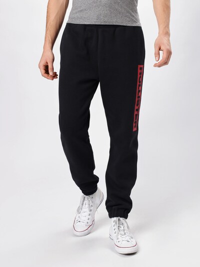 HOLLISTER Kalhoty 'Cyber' - červená / černá, Model/ka