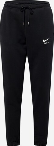 Nike Sportswear Tapered Trousers in Black: front