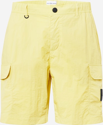 Calvin Klein Jeans Regular Cargo Pants in Yellow: front