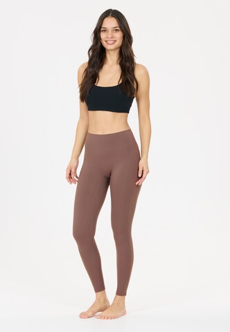 Athlecia Regular Tights 'Eman' in Braun