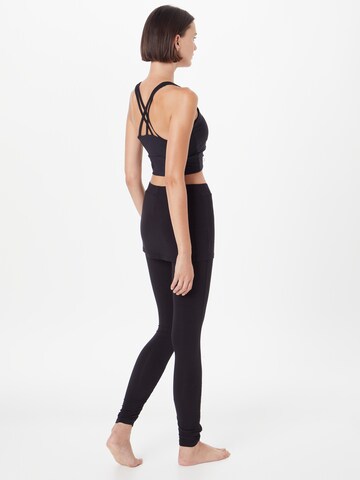 CURARE Yogawear Skinny Sporthose 'Flow' in Schwarz