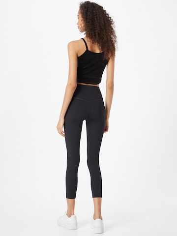 Skinny Pantaloni sport de la Girlfriend Collective pe negru