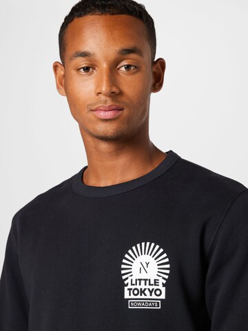 NOWADAYS Sweatshirt 'Rising Sun' in Black