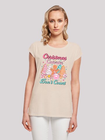 T-shirt 'Christmas Calories Dont Count Candy' F4NT4STIC en beige : devant