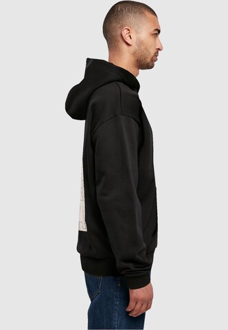 Merchcode Sweatshirt 'Missing Piece' in Black