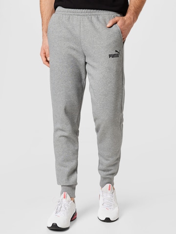 PUMA - Tapered Pantalón deportivo 'Essential' en gris: frente