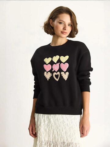 Sweat-shirt Bianco Lucci en noir : devant