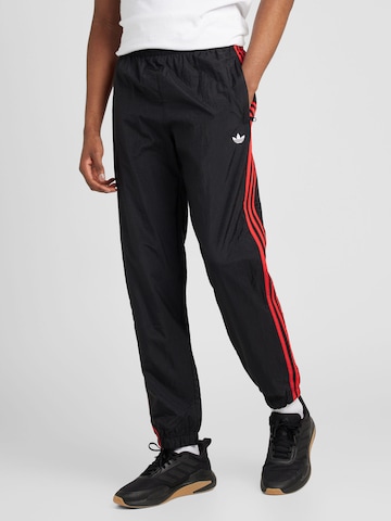 Tapered Pantaloni 'Rekive ' de la ADIDAS ORIGINALS pe negru: față