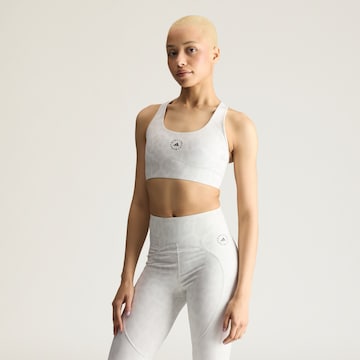 Bustino Reggiseno sportivo 'PrimeLiftImpact' di ADIDAS BY STELLA MCCARTNEY in bianco: frontale