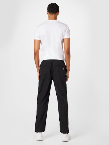 Loosefit Pantalon Tommy Jeans en noir