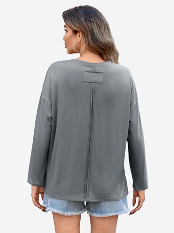 Tricou de la Imily Bela pe gri: spate