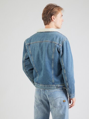 LEVI'S ® Демисезонная куртка 'Type III Sherpa Trucker Jacket' в Синий