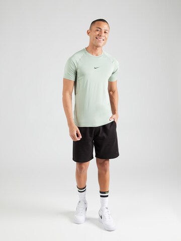 NIKE Funkcionalna majica | zelena barva