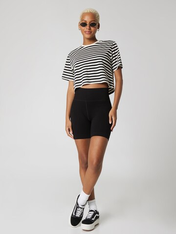 Skinny Pantaloni 'Kira' de la A LOT LESS pe negru