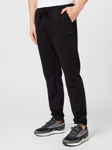 Champion Authentic Athletic Apparel Tapered Pants in Black: front