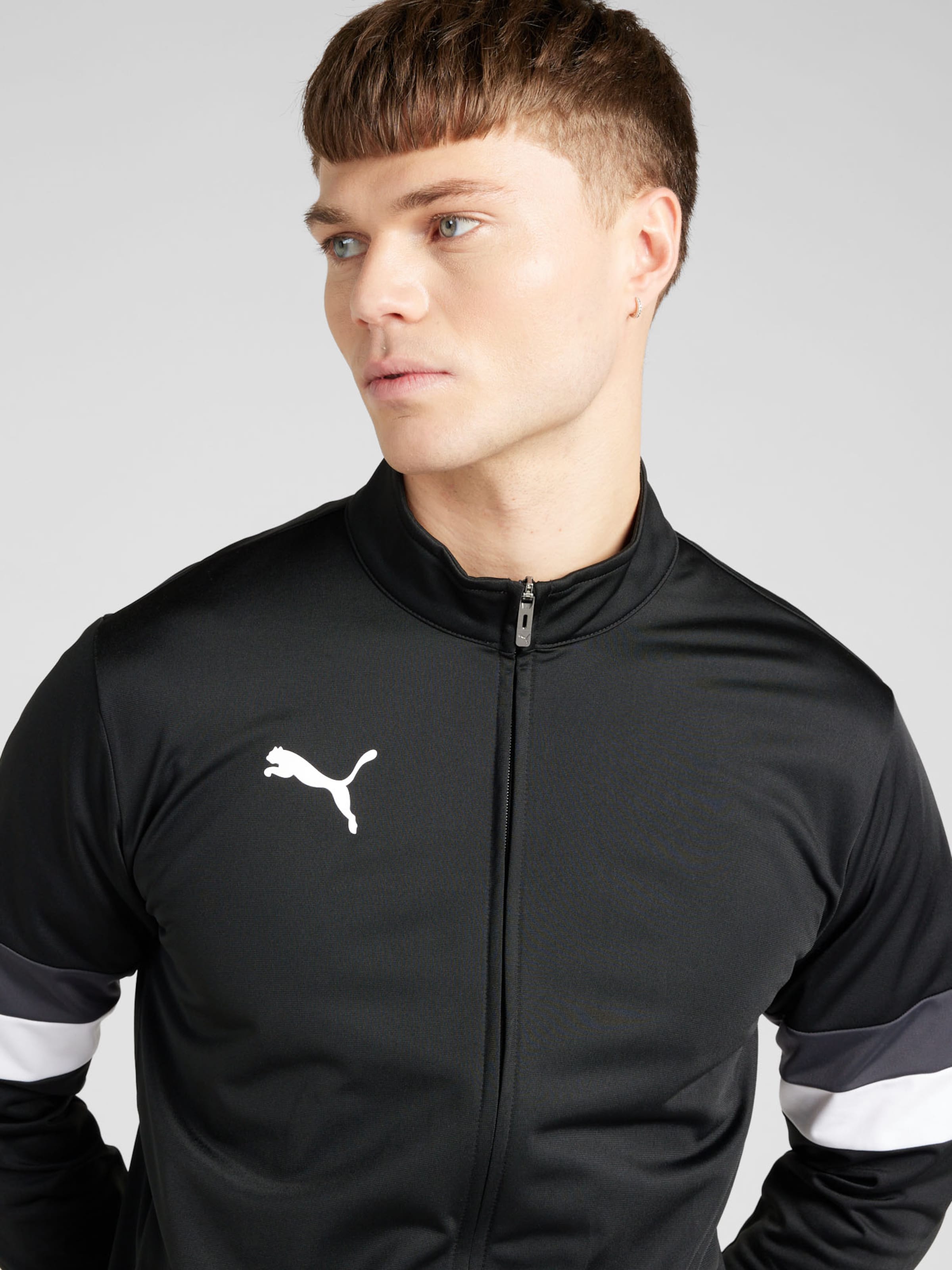 PUMA Tracksuit TeamRISE in Black ABOUT YOU