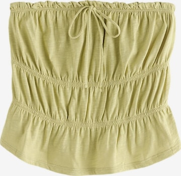 Haut Next en vert : devant