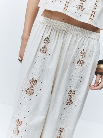 Next - Pierna ancha Pantalón en beige