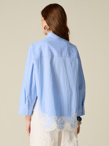 Camicia da donna di oltre in blu