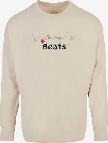 Merchcode Shirt 'Christmas beats' in Beige: voorkant