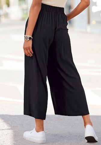 LASCANA - Perna larga Calças com vincos em preto