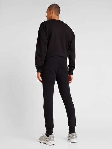 Effilé Pantalon de sport AÉROPOSTALE en noir