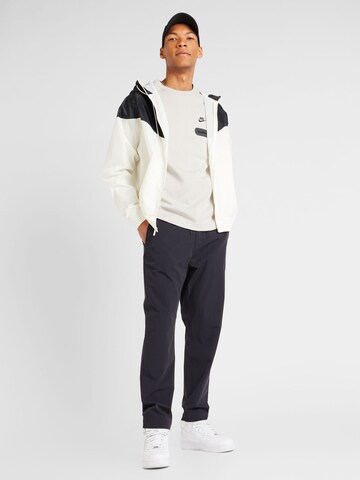 Nike SportswearPrijelazna jakna - bež boja