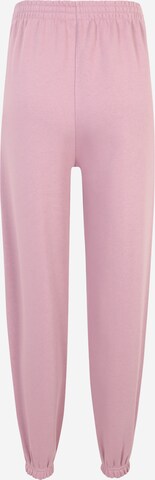 Tapered Pantaloni sportivi di Reebok in rosa