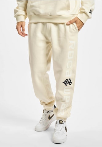 ROCAWEAR Конический (Tapered) Штаны в Бежевый: спереди