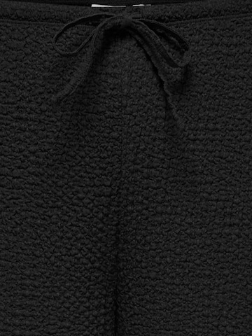 ONLY Carmakoma - Pierna ancha Pantalón 'CARErikka' en negro