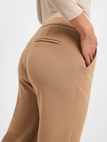 Marie Lund Flared Pants in Brown