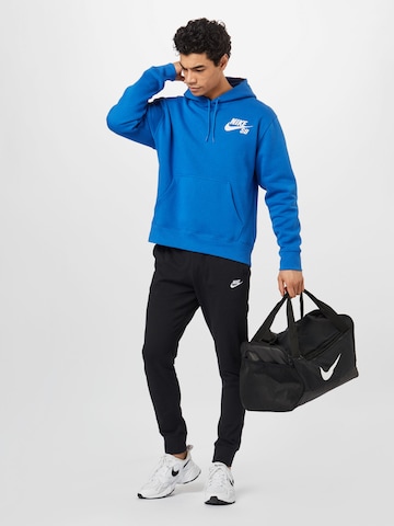 Nike Sportswear Tapered Broek in Zwart