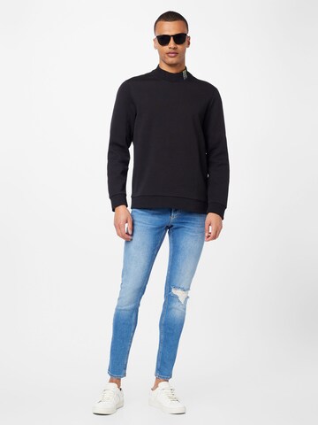 Coupe slim Jean 'Scanton' Tommy Jeans en bleu